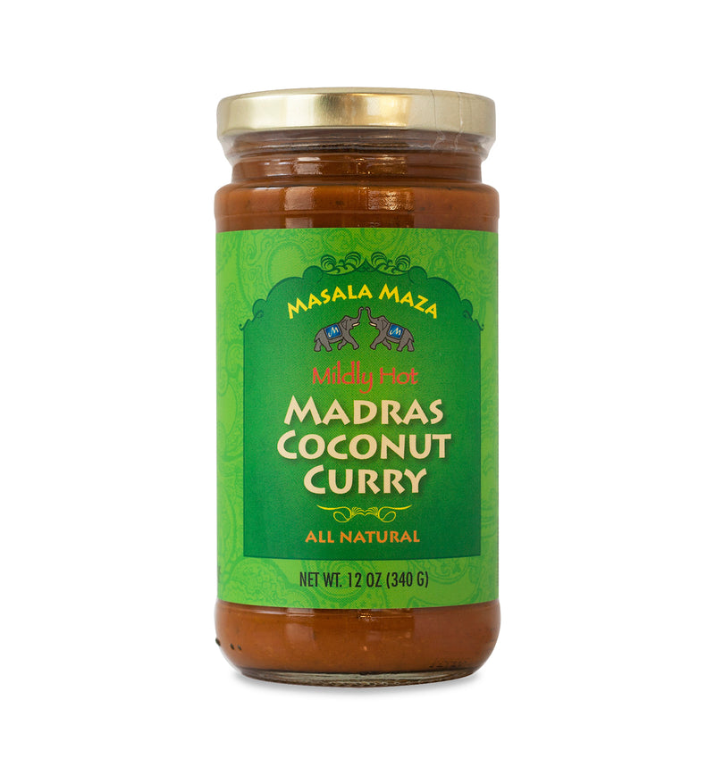 Gold-lidded jar of curry on white background. The jar is covered in a green label that says, “Masala Maza Mildly Hot Madras Coconut Curry - All Natural – Net Weight 12oz (340 G)”.