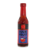 Glass ring neck bottle of fruit sauce on white background. The bottle is covered in black, red, and indigo label that says, “Heaven and Earth Four Fruit Sauce – Net 8oz (236ml)”.