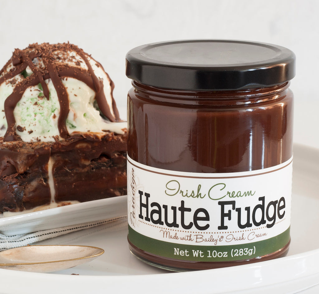 Paradigm Foodworks Irish Cream Haute Fudge and fudge brownie topped with a scoop of mint ice cream and drizzles of Irish Cream Haute Fudge.