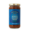 Gold-lidded jar of sauce on white background. The jar is covered in a deep blue label that says, “Masala Maza Mild & Nutty Korma Simmer Sauce – All Natural – Net Weight 12oz (340 G)”.