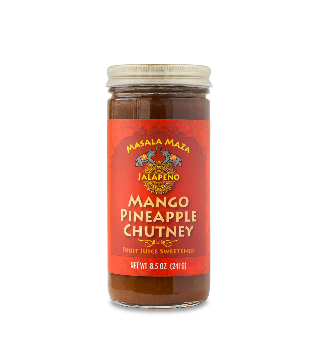 Gold-lidded jar of chutney on white background. The jar is covered in a green label that says, “Masala Maza Key Lime Mango Pineapple Chutney – Fruit Juice Sweetened – Net Weight 8.5oz (241 G)”. 