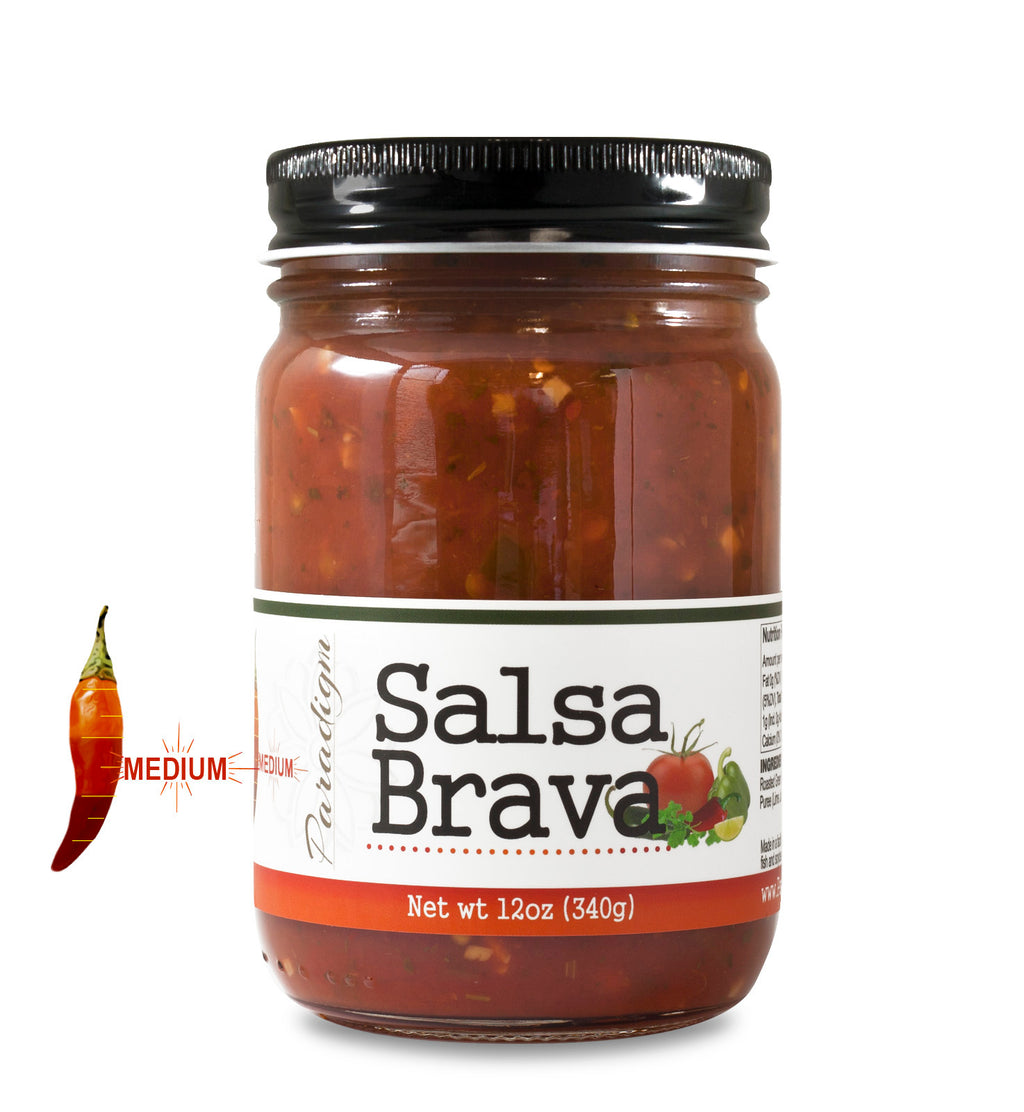 Jar full of salsa on white background with “Medium” spice indicator to the left. The jar is labeled, “Paradigm Salsa Brava – Net Weight 12oz (340g)”.