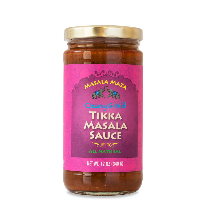 Gold-lidded jar of sauce on white background. The jar is covered in a hot pink label that says, “Masala Maza Creamy & Mild Tikka Masala Sauce – All Natural – Net Weight 12oz (340 G)”. 
