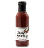 Glass ring neck bottle filled with ketchup on white background. The bottle is labeled, “Paradigm Classic Ketchup Made with all non-GMO ingredients – 12 fl oz (355ml)”.